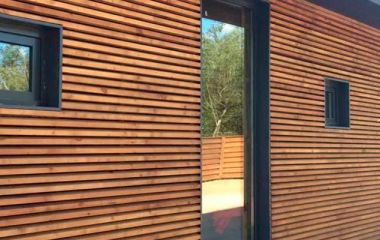 Отделка фасада каркасного дома планкеном